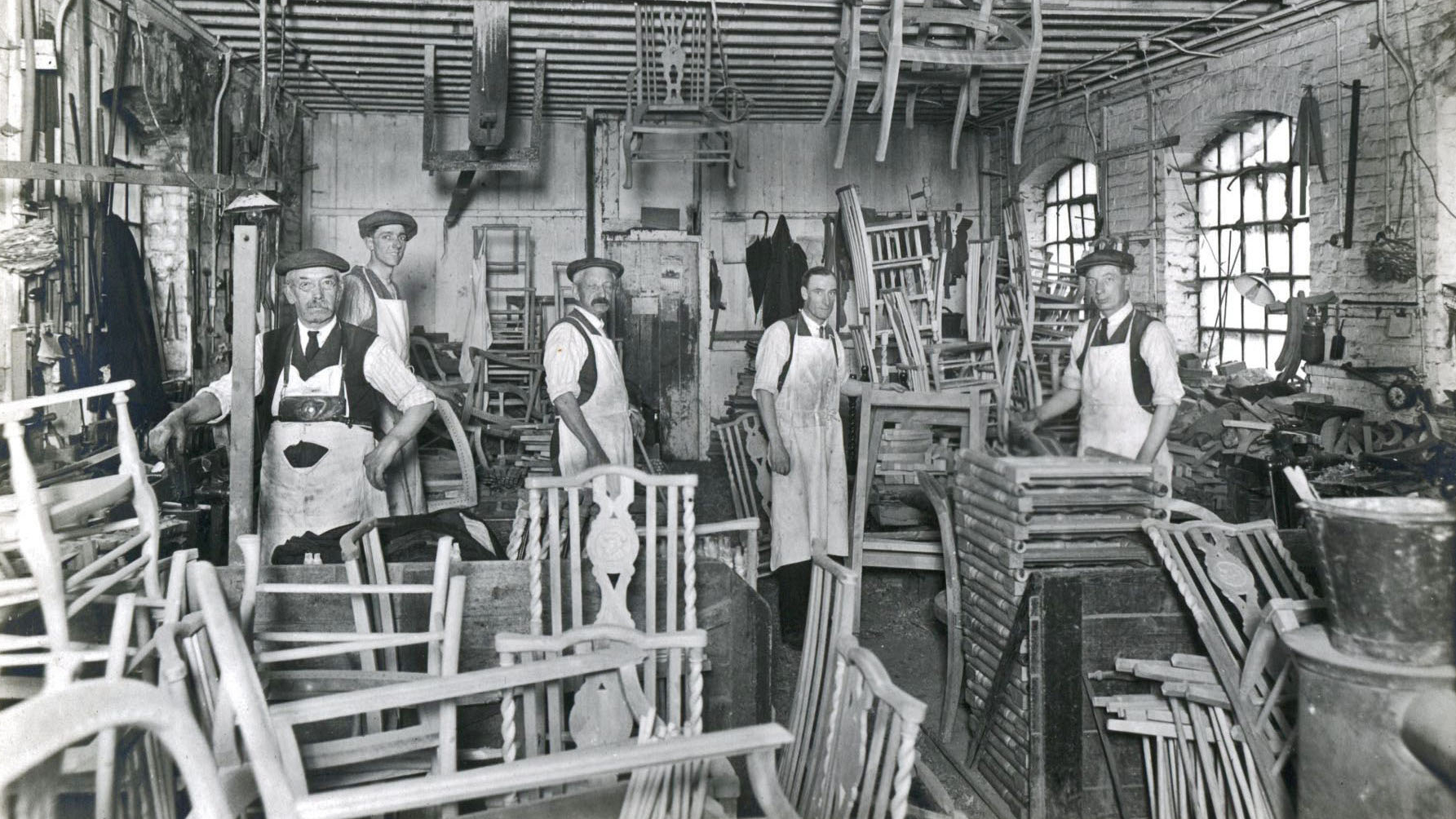 a black and white image of the original ercol chair factory in High Wycombe 
