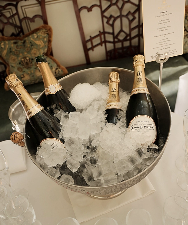 Champagne bottles in a bucket of ice
